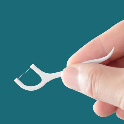 Wukusy 2-in-1 tooth picks and floss sticks set, portable dental picks with floss, 50-piece pack for oral hygiene.