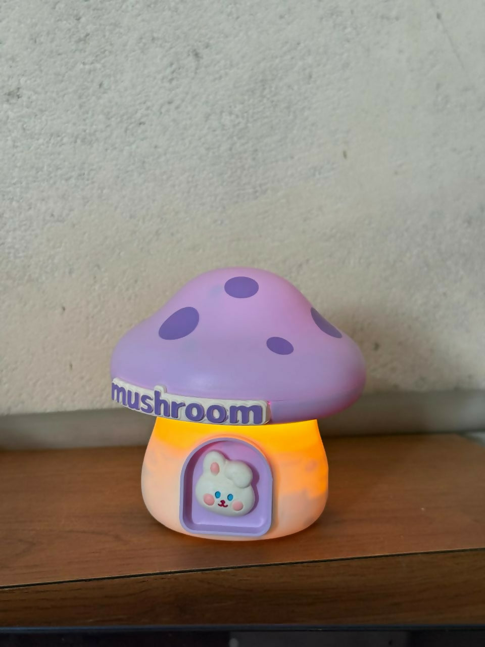 Wukusy Mushroom LED desk lamp with pencil sharpener and USB port, featuring a colorful, modern design for workspace illumination.