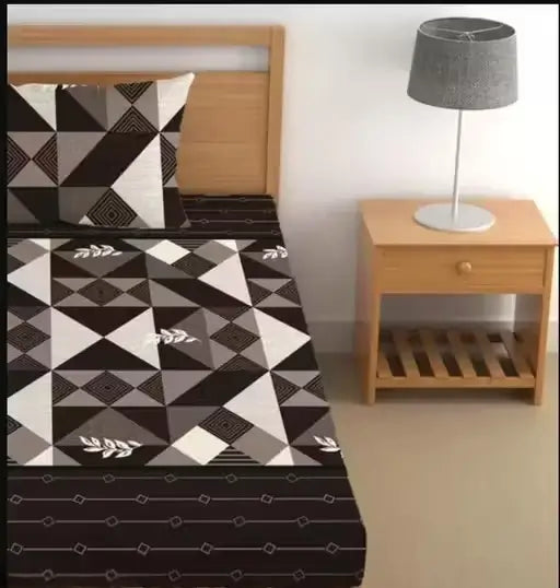 Ekom single cotton bedsheet with geometric print and matching pillow cover, perfect for summer use, featuring superfine fabric.