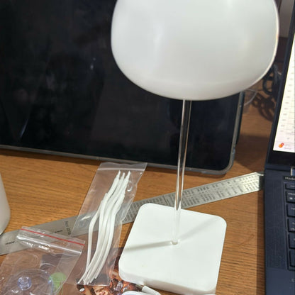 Warm jellyfish night light lamp by Wukusy emitting a soft ambient glow, perfect for cozy home decor and relaxing atmospheres.