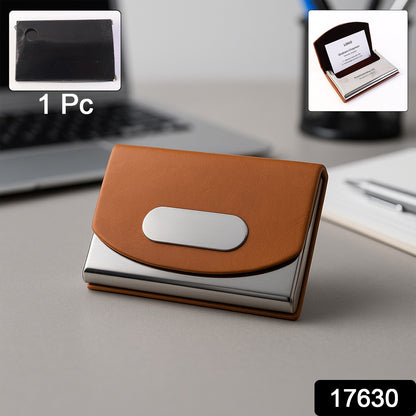 Leather and stainless-steel business card holder by Wukusy, compact and stylish for organizing cards on a desk or in a pocket.