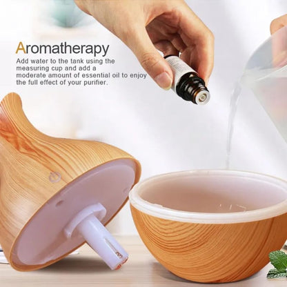 Pot-shaped wooden humidifier by FIZZI SHOP JK SIDHU, showing a rustic wooden design with a spout and humidifying opening.