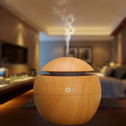 FIZZI SHOP wooden humidifier diffuser showing a sleek wooden design with mist spray and adjustable controls.