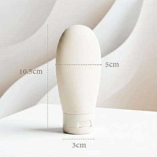 Three 60ml travel bottles from FIZZI SHOP, transparent plastic containers with white screw caps, ideal for toiletries on the go.