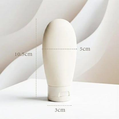 Three 60ml travel bottles from FIZZI SHOP, transparent plastic containers with white screw caps, ideal for toiletries on the go.
