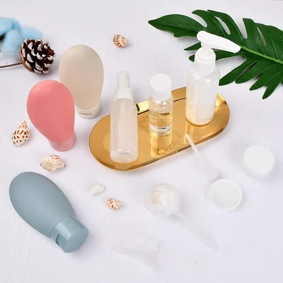 Set of 11 FIZZI SHOP travel bottles in various sizes with leak-proof caps, ideal for toiletries and liquids during travel.
