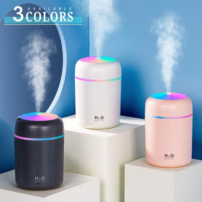 FIZZI SHOP H2O Humidifier with sleek white design and adjustable mist outlet on a modern bedside table