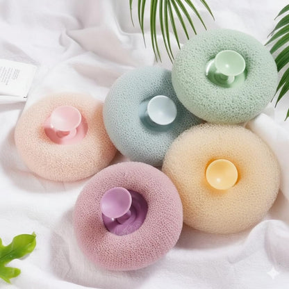 Round loofah scrubbing brush by FIZZI SHOP with textured natural loofah surface for gentle exfoliation and cleansing.
