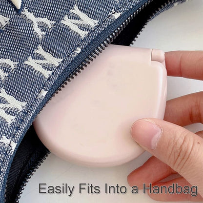 Mini travel sewing kit by FIZZI SHOP JK SIDHU with colorful threads, needles, and small sewing accessories in a compact case.