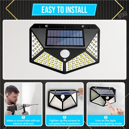 FIZZI SHOP 100 LED motion sensor solar light mounted on outdoor wall, illuminating with bright white LEDs at night