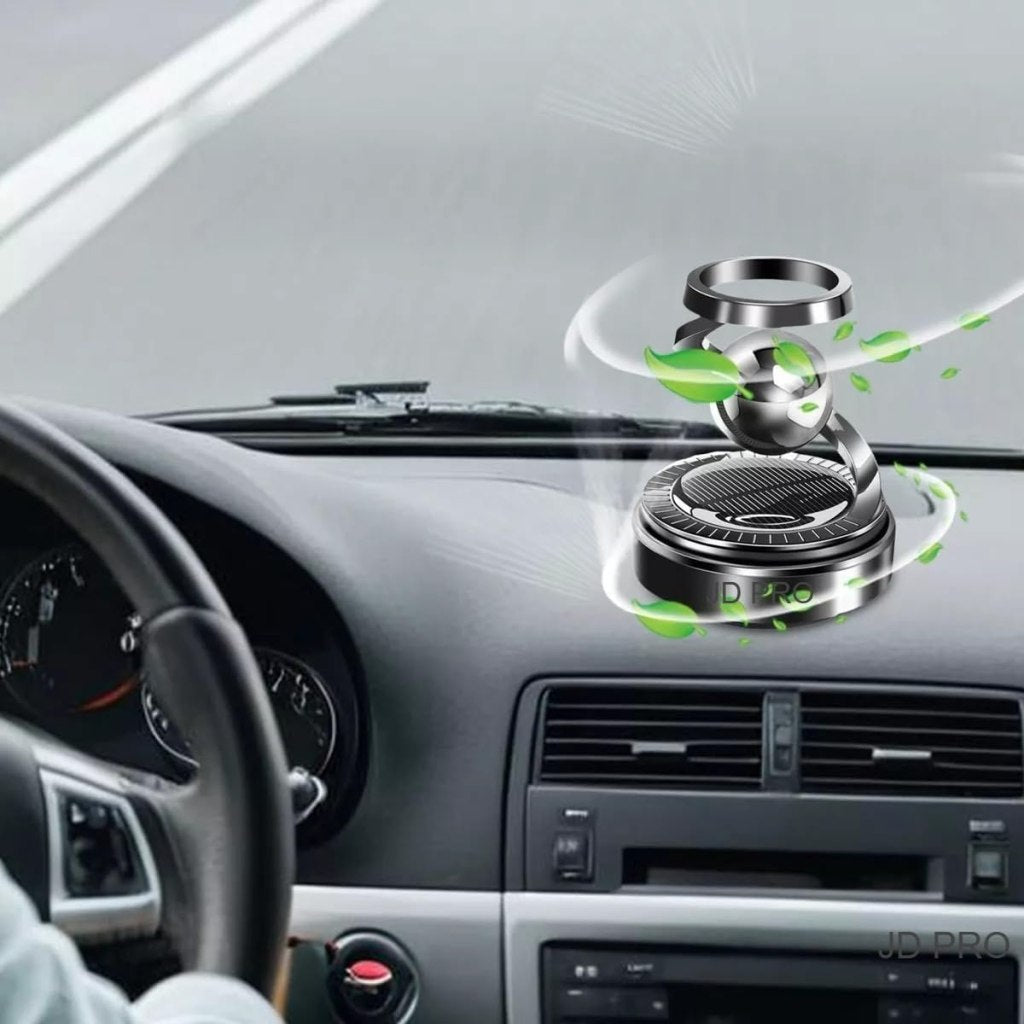 FIZZI SHOP JK SIDHU solar car air freshener attached to a car dashboard, emitting a fresh scent with a compact, eco-friendly design