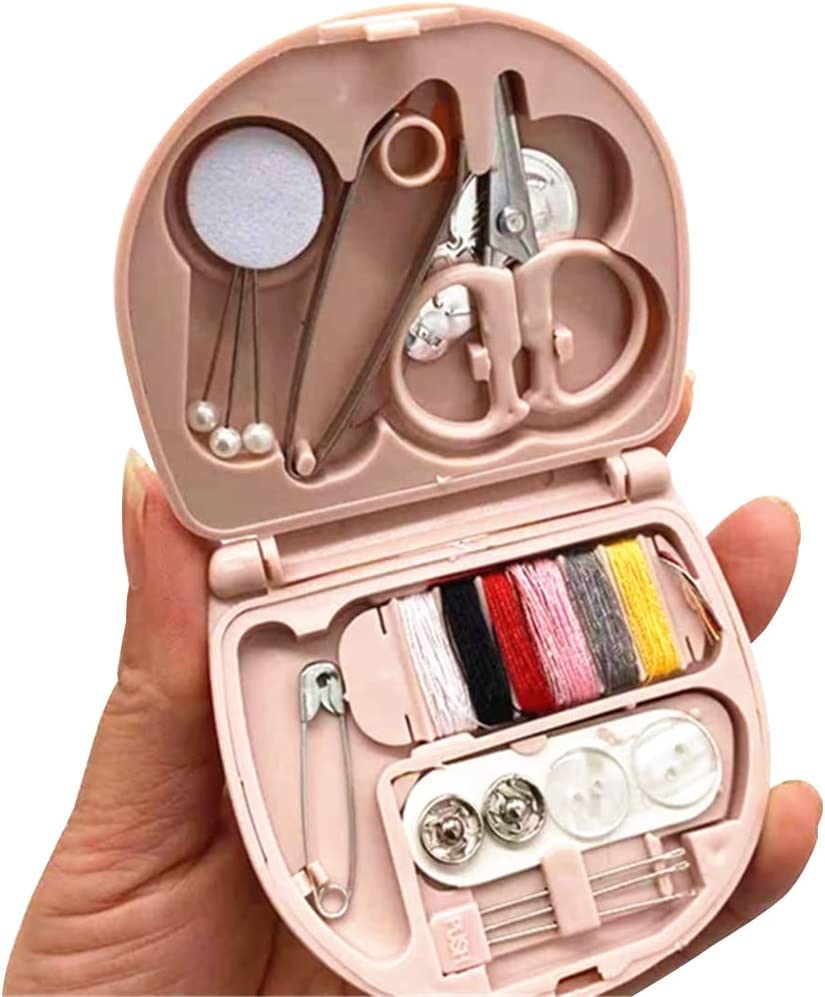 Mini travel sewing kit by FIZZI SHOP JK SIDHU with needles, thread, and small sewing tools in a compact case for on-the-go repairs.
