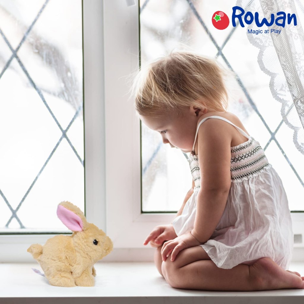 FIZZI SHOP JK SIDHU walking and talking rabbit toy with movable limbs and animated mouth, designed for children.