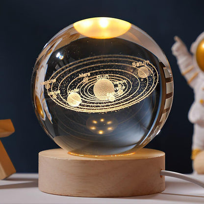 3D crystal ball night lamp by FIZZI SHOP with intricate design, glowing softly in a dark room, creating a calming ambiance.