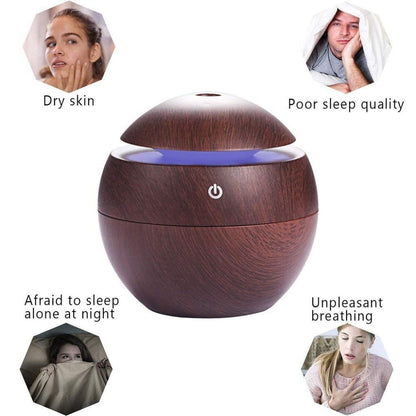 Wooden humidifier diffuser by FIZZI SHOP showing a sleek wooden design with mist coming from the top.