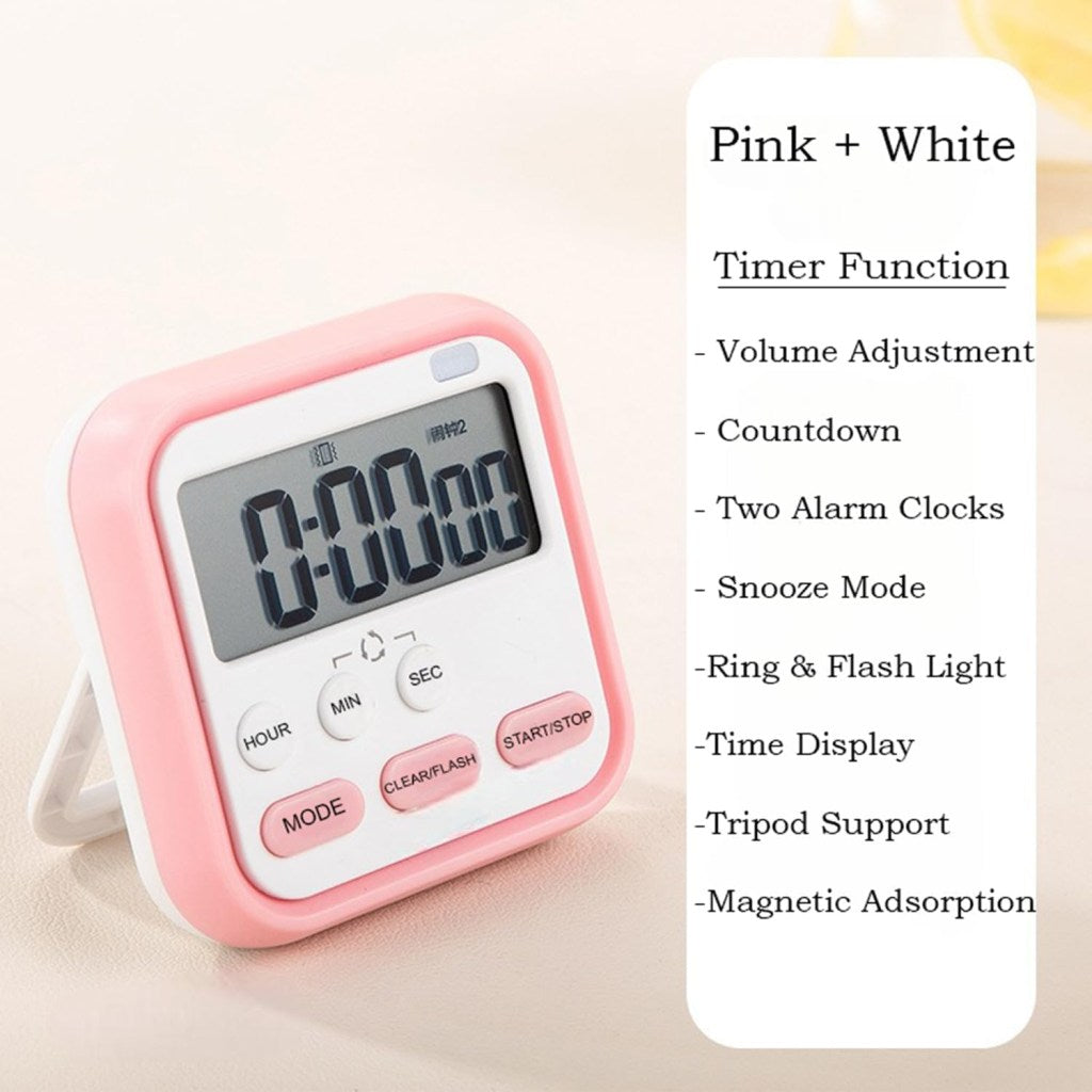 Digital kitchen timer and alarm clock by FIZZI SHOP JK SIDHU with clear digital display and countdown buttons.