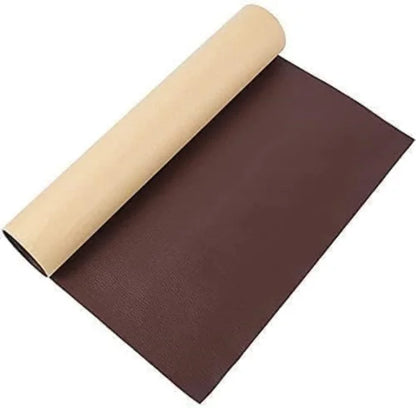 Brown leather patch from FIZZI SHOP, showing textured genuine leather with stitched edges for sewing or decorating projects.