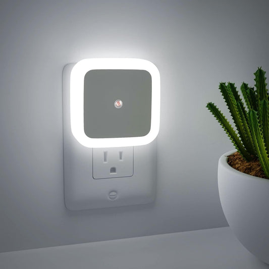 FIZZI SHOP sensor night light illuminating a dark room with a sleek, modern design and automatic motion sensor.