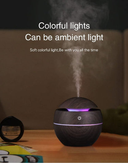 Wooden humidifier diffuser by FIZZI SHOP showing a sleek wooden design with a small water reservoir and mist outlet.