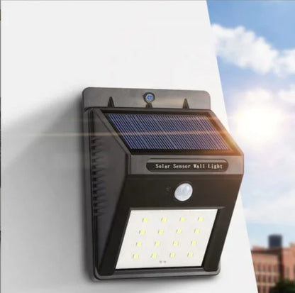 FIZZI SHOP 20 LED solar light with motion sensor highlighting the bright LEDs and adjustable mounting bracket in outdoor setting.