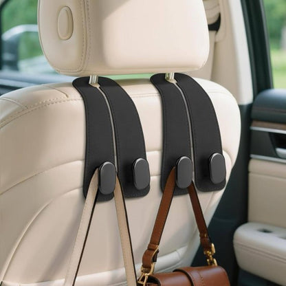 Leather car seat headrest hook by FIZZI SHOP attached to headrest, ideal for hanging bags and accessories in vehicle.