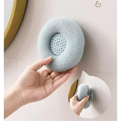 Round loofah scrubbing brush from FIZZI SHOP with textured natural fibers for gentle exfoliation and cleaning.