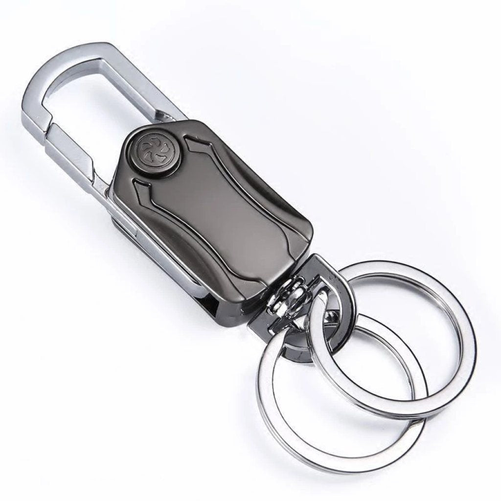 FIZZI SHOP JK SIDHU 5-in-1 keychain spinner with multiple rotating sections and compact design for easy carrying.