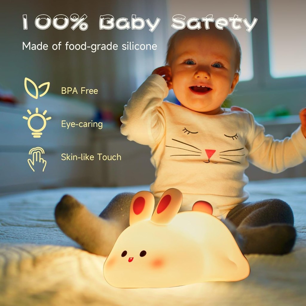 Silicone rabbit lamp by FIZZI SHOP, soft pink color with smooth finish, perfect for children's room or cozy decor.