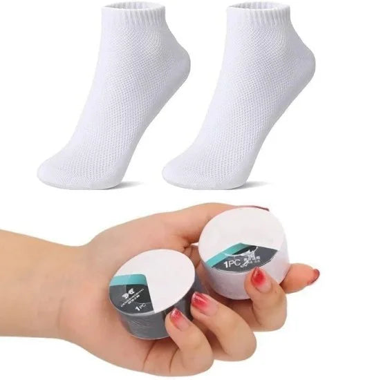 Disposable travel portable socks by FIZZI SHOP, shown in a compact pack ideal for on-the-go comfort and hygiene.
