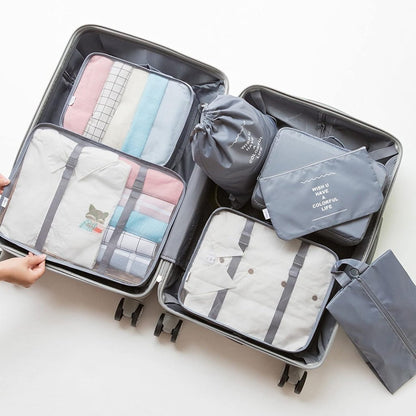 Seven-piece travel organizer pouch set by FIZZI SHOP with multiple compact storage bags for toiletries and accessories.