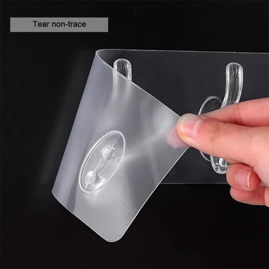 Six FIZZI SHOP self-adhesive hook stickers on a surface, versatile for hanging lightweight items around the home or office.