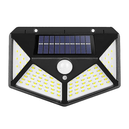 FIZZI SHOP 100 LED motion sensor solar light mounted outdoors, illuminating the area with bright, energy-efficient lighting.
