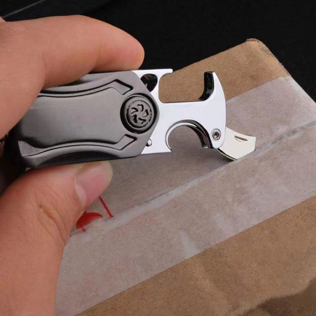 FIZZI SHOP JK SIDHU 5-in-1 keychain spinner with multiple spinning elements and colorful design on a keychain.