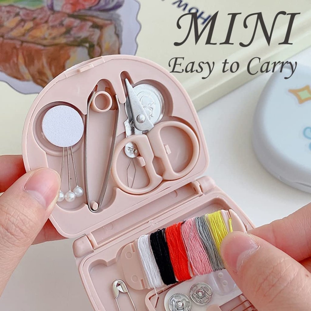 Mini travel sewing kit by FIZZI SHOP JK SIDHU with assorted needles, threads, and small sewing tools in a compact case.