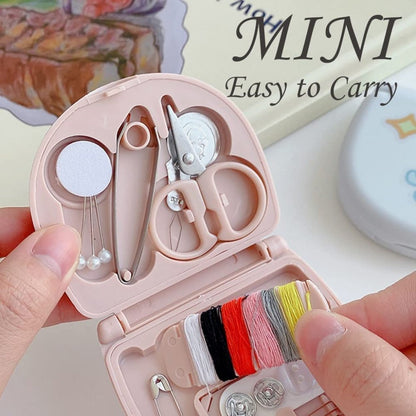 Mini travel sewing kit by FIZZI SHOP JK SIDHU with assorted needles, threads, and small sewing tools in a compact case.
