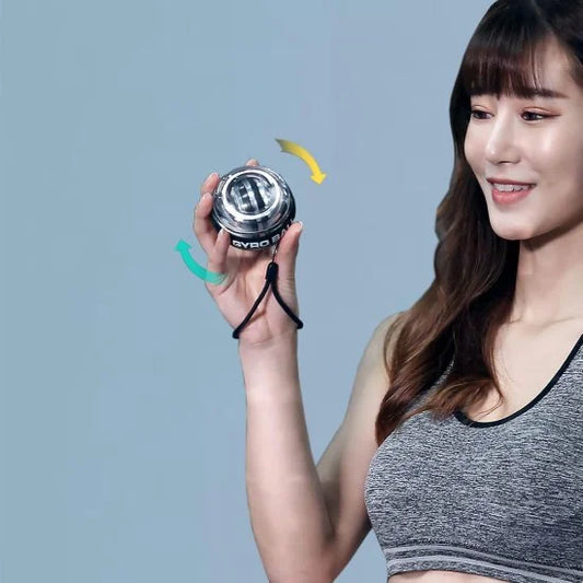 FIZZI SHOP gyro ball spinning in hand, showcasing its sleek design and smooth motion for hand exercise and stress relief.