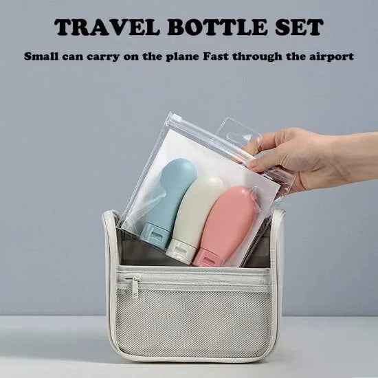Set of three 60ml travel bottles from FIZZI SHOP, clear plastic bottles with blue caps for toiletries and liquids.