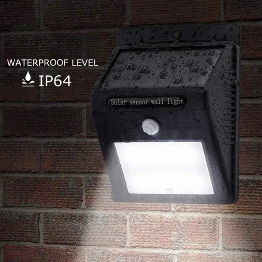 FIZZI SHOP 20 LED Solar Light with Motion Sensor illuminating outdoor space at night, energy-efficient security lighting.