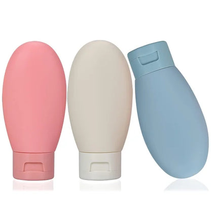Set of three 60ml travel bottles from FIZZI SHOP, reusable plastic containers for toiletries and liquids during travel.