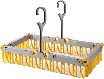 Foldable cloth dryer hanger from FIZZI SHOP, lightweight and compact, with multiple clothespin clips for drying clothes.