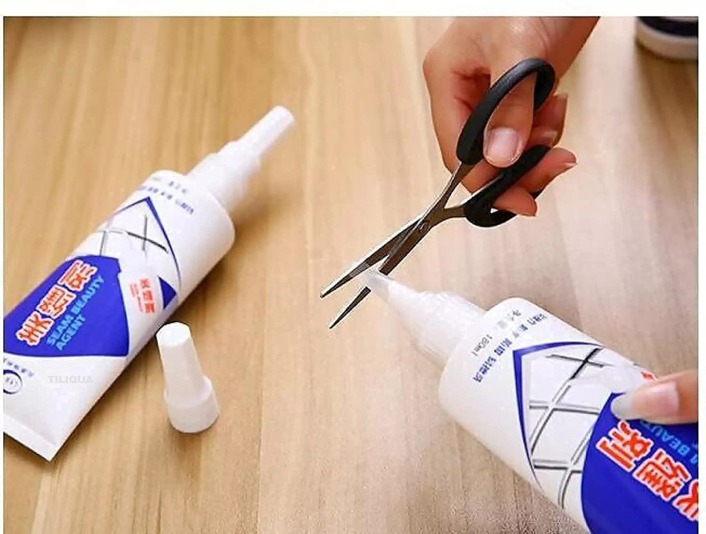 FIZZI SHOP JK SIDHU Tiles Gape Filler in white, designed to fill gaps between tiles for a seamless finish.