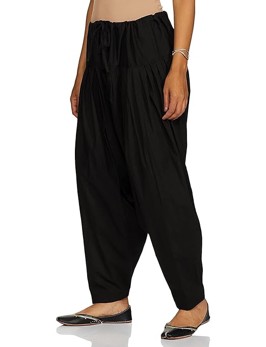 Black woman plain cotton Patiala Salwar from FIZZI SHOP, showcasing a comfortable, loose-fit traditional Indian pants.