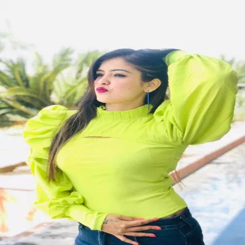 Green women’s top by FIZZI SHOP, featuring a classy design with a blended fabric and stylish fit.