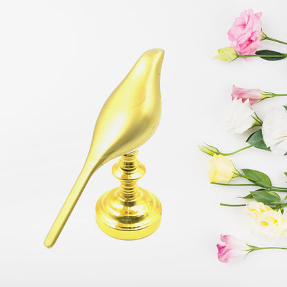 Wukusy Sparrow LED table lamp with crystal decoration, soft light, energy-saving home decor lamp on a wooden surface.