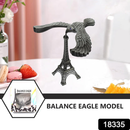 Wukusy Balancing Bird Eiffel Tower Statue with eagle toy, metal sculpture featuring a bird perched on a miniature Eiffel Tower.