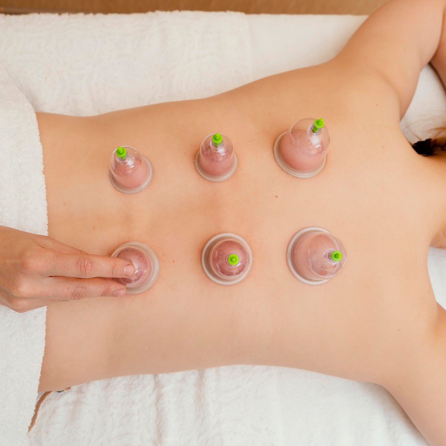 Wukusy 6614a vacuum cupping set with six suction pumps and therapy massagers for home relaxation and muscle relief.