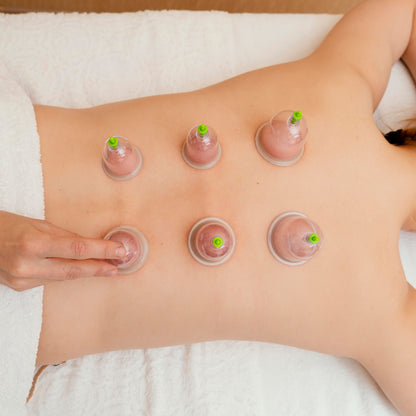 Wukusy 6614a vacuum cupping set with six suction pumps and therapy massagers for home relaxation and muscle relief.