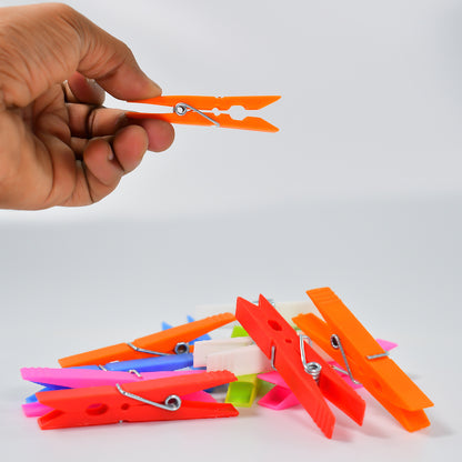 Set of 144 Wukusy multi-purpose plastic clothes clips for cloth drying, ideal for home laundry and hanging garments.
