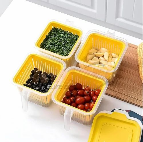Plastic fridge organizer storage box with handle for easy access, ideal for kitchen and home organization.