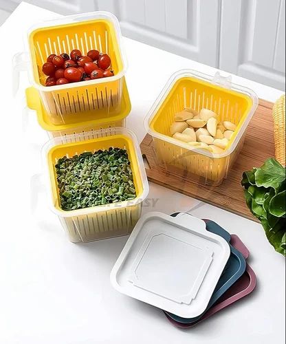 Plastic fridge organizer storage box with handle, ideal for kitchen organization and easy to carry.